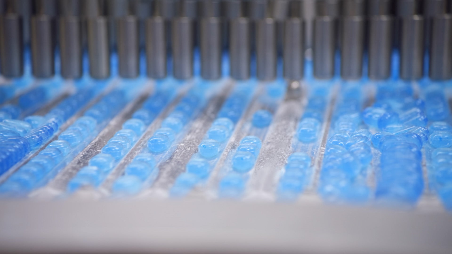 light blue, clear pills